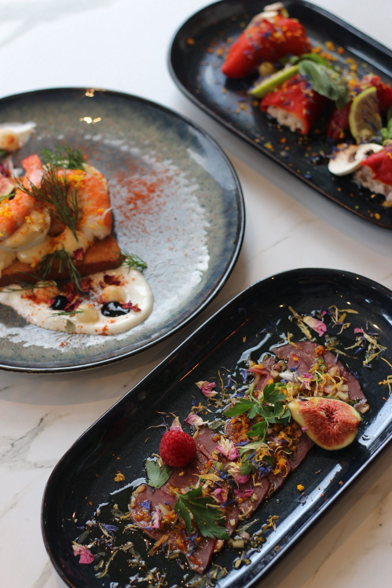 Trio d'assiettes — crevettes, piquillos & magret — Felicia Deauville